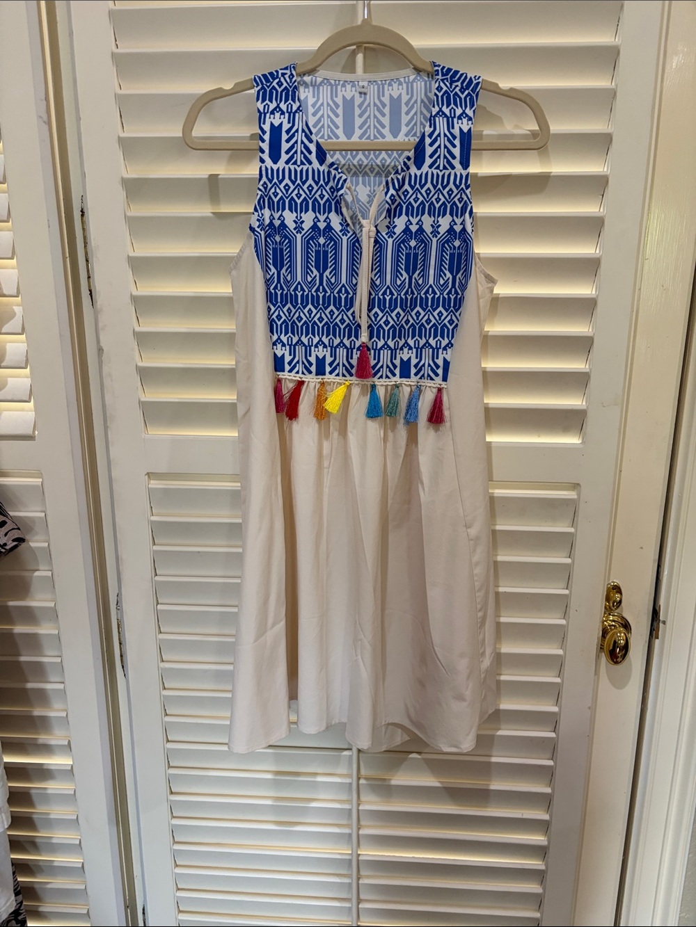 Sleeveless Cream Dress with Blue Embroidered Bodice & Colorful Tassels. Small